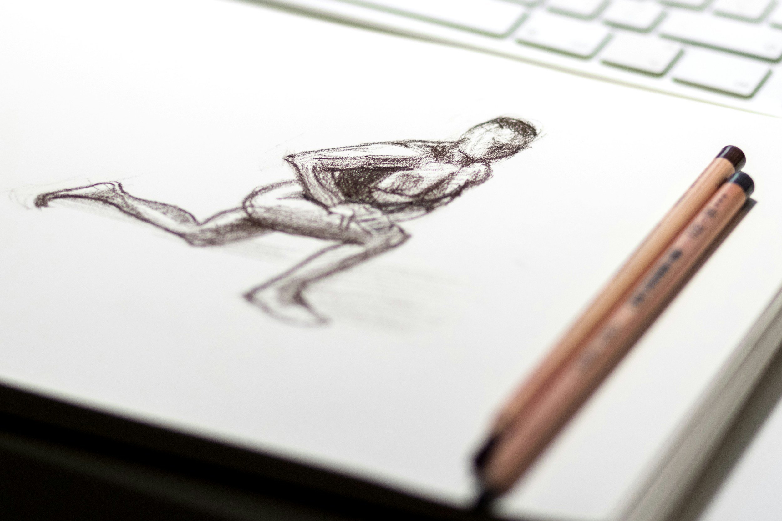 A pencil figure drawing in progress